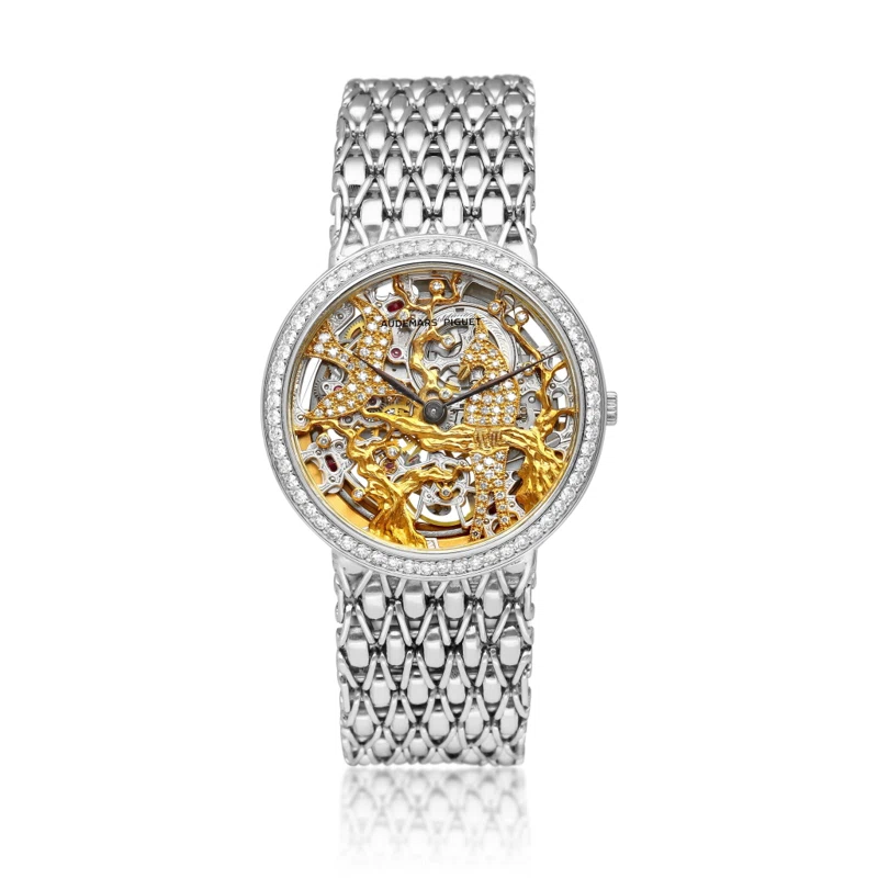 Audemars Piguet. A white gold and diamond-set skeletonized automatic bracelet watch. Circa 1995 