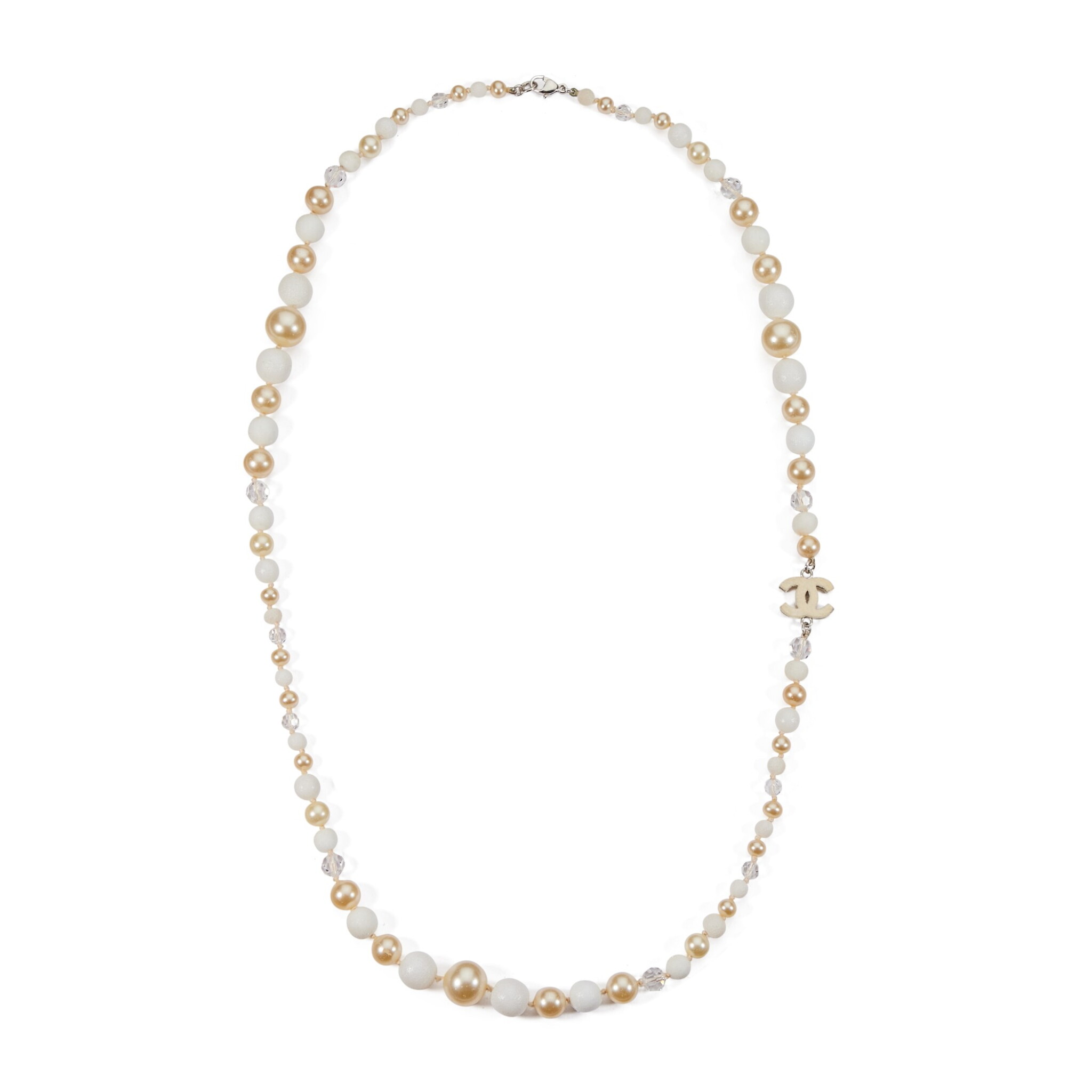 White, Beige, and Silver Imitation Pearl, Crystal, and Metal Long Strand CC Necklace, 2003 — view 1