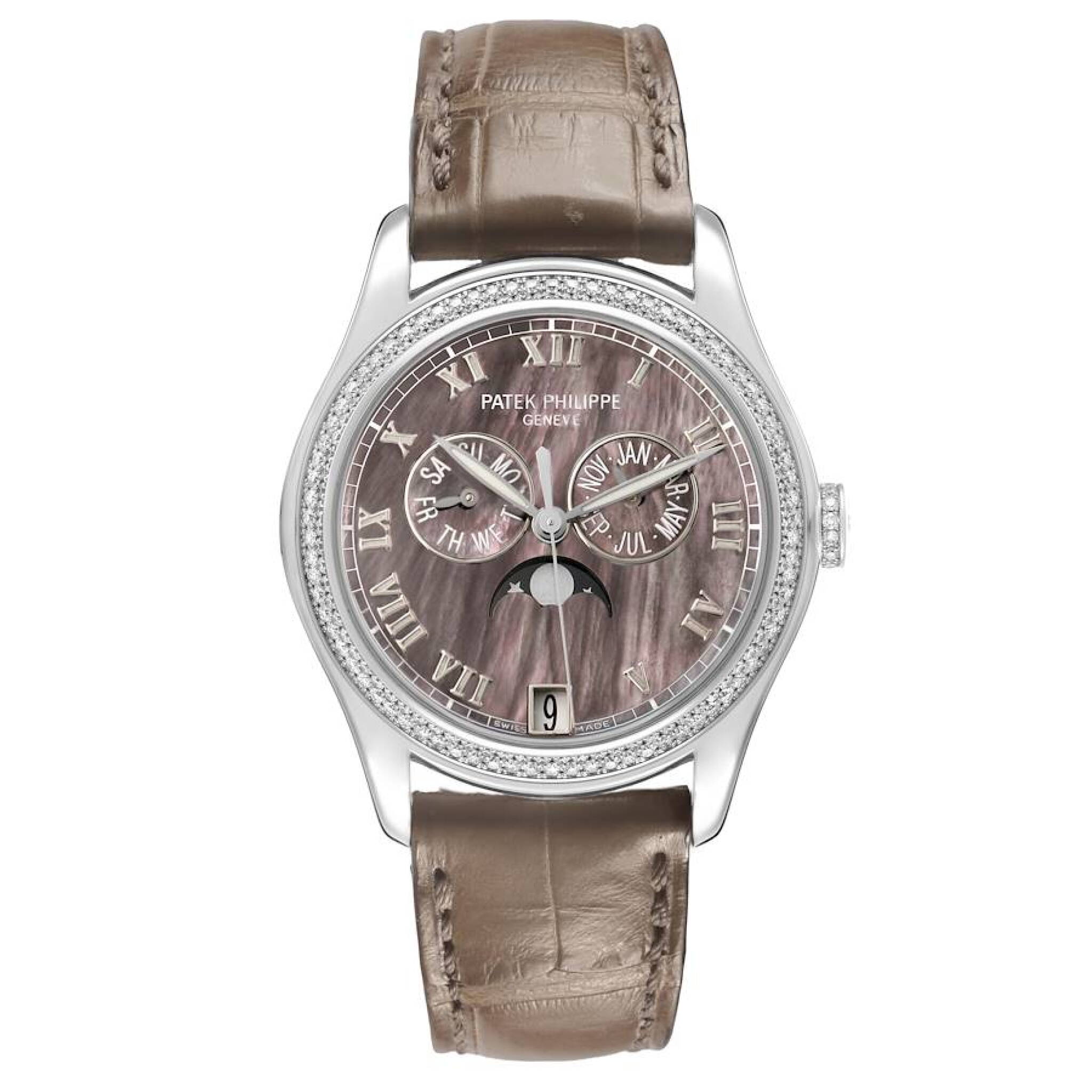 Complications (Reference 4936G-001). A 37mm white gold diamond-set automatic wristwatch with date, day, month, moon phase, and annual calendar. 2013 — view 1