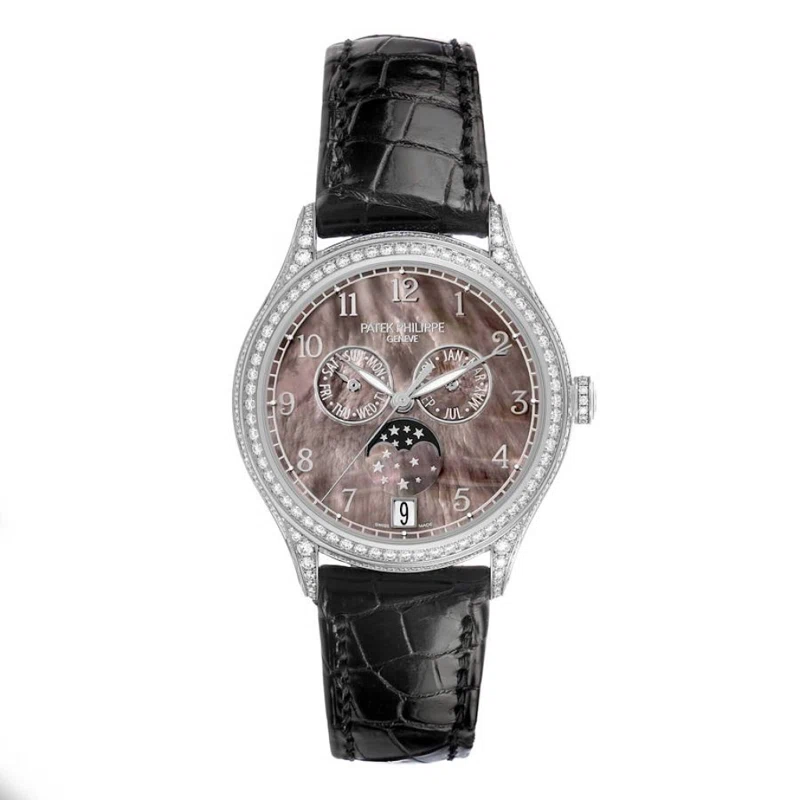 Complications (Reference 4948G). A 38mm white gold diamond-set automatic wristwatch with date, day, month, moon phase, and annual calendar.