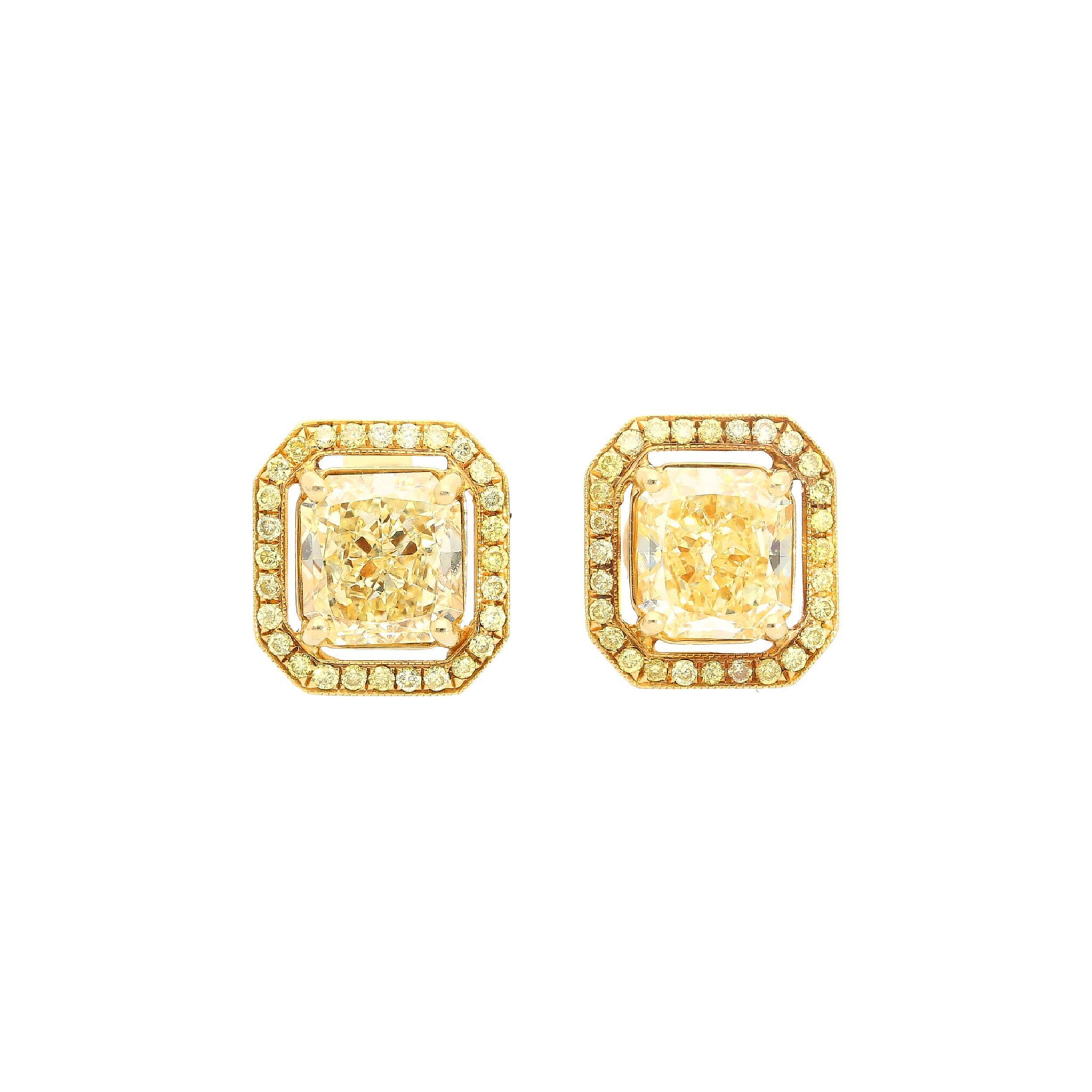 Gold, 2.92ctw Radiant Cut Fancy Light Yellow Diamond and Yellow Diamond Stud Earrings — view 1