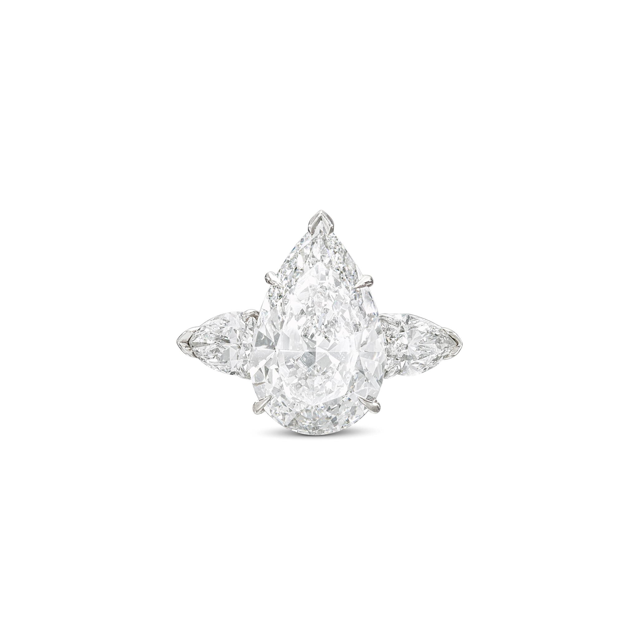 Platinum, 7.05ct Pear Shape Diamond and Diamond Engagement Ring — view 1