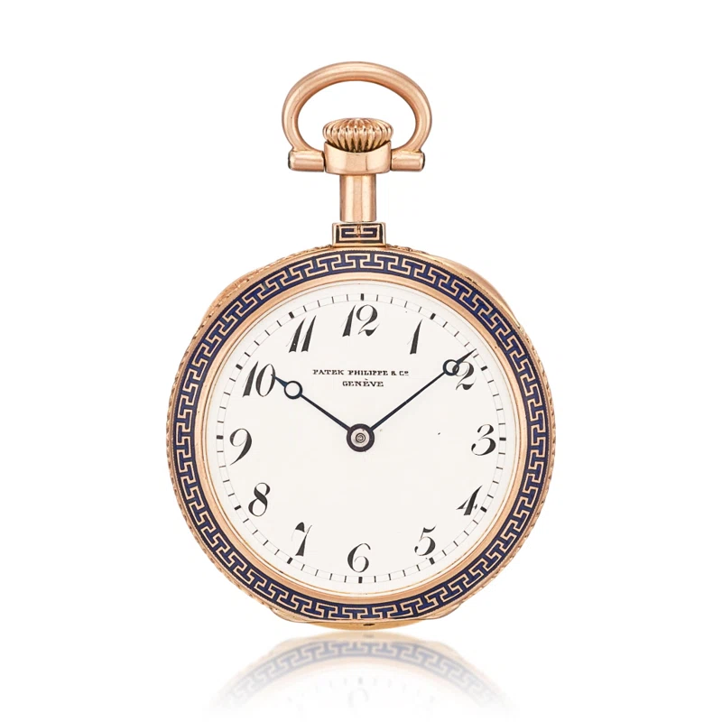 Patek Philippe. A pink gold open face keyless mechanical watch with applied blue enamel and enamel dial. Circa 1890