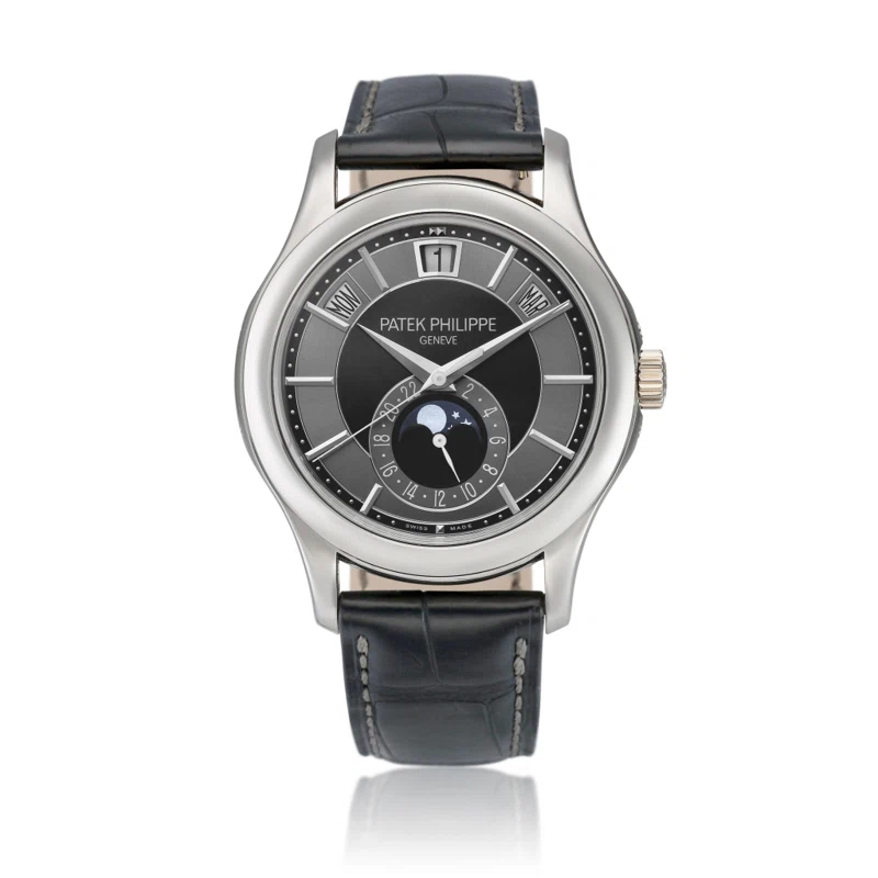 Complications (Reference 5205). A 40mm white gold automatic wristwatch with date, day, month, moon phase, 24 hour-format, and annual calendar. 2011