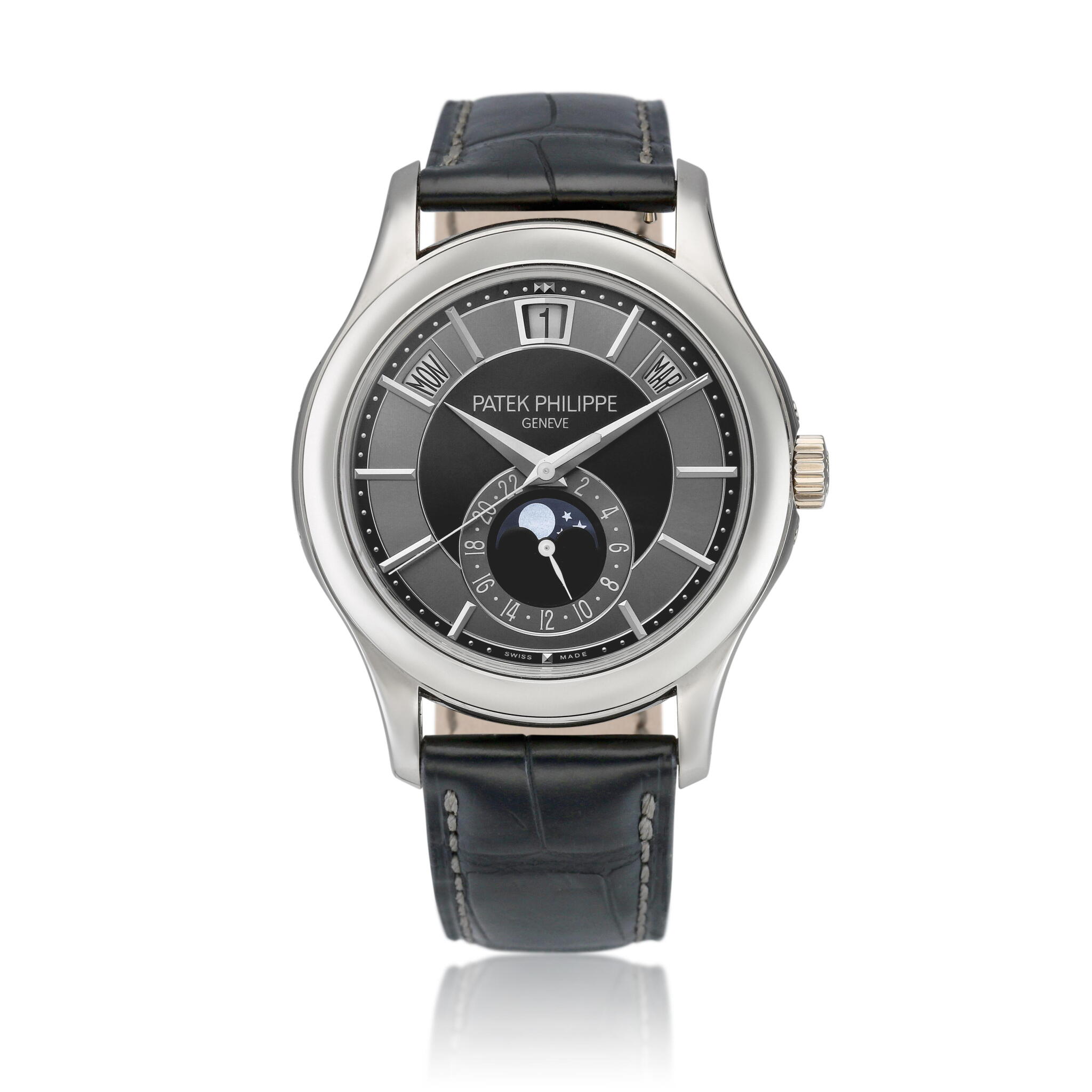 Complications (Reference 5205). A 40mm white gold automatic wristwatch with date, day, month, moon phase, 24 hour-format, and annual calendar. 2011 — view 1