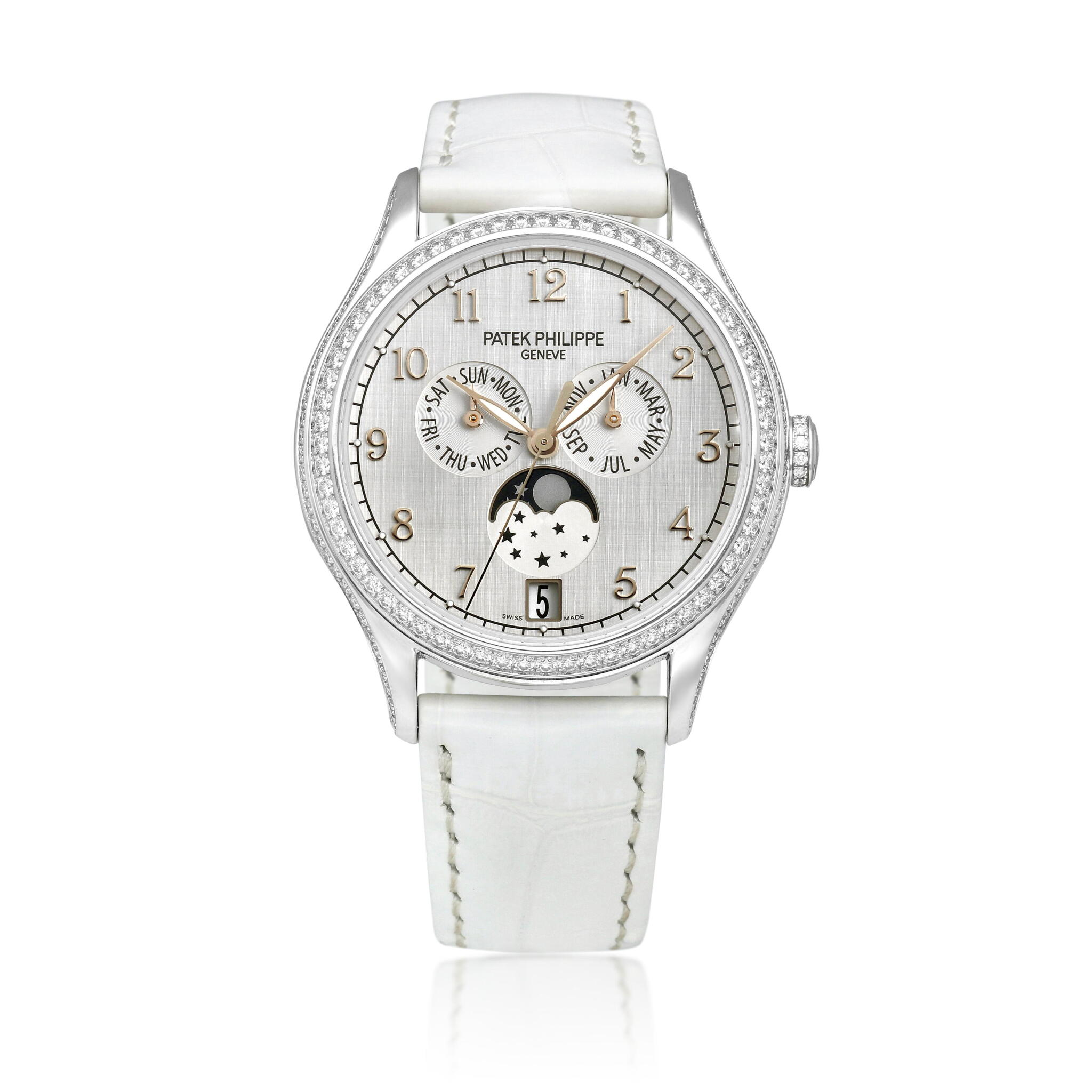 Complications (Reference 4947). A 38mm white gold diamond-set automatic wristwatch with date, day, month, moon phase, and annual calendar. 2019 — view 1