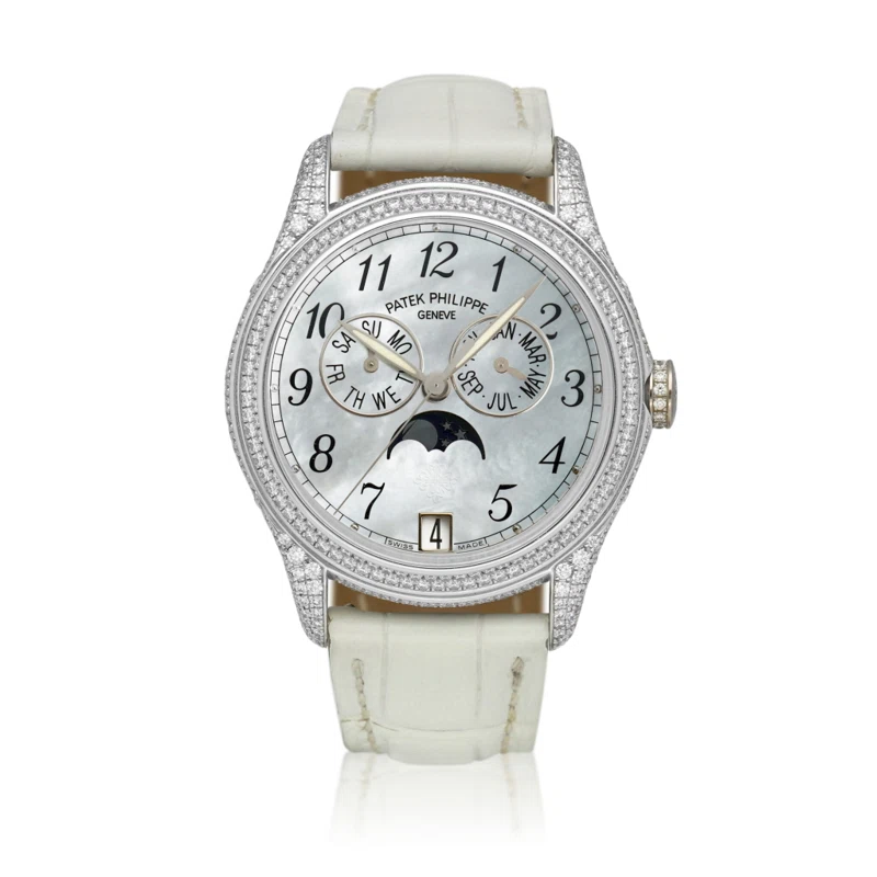 Complications (Reference 4937). A 37mm white gold diamond-set automatic wristwatch with date, day, month, moon phase. and annual calendar. 2007 
