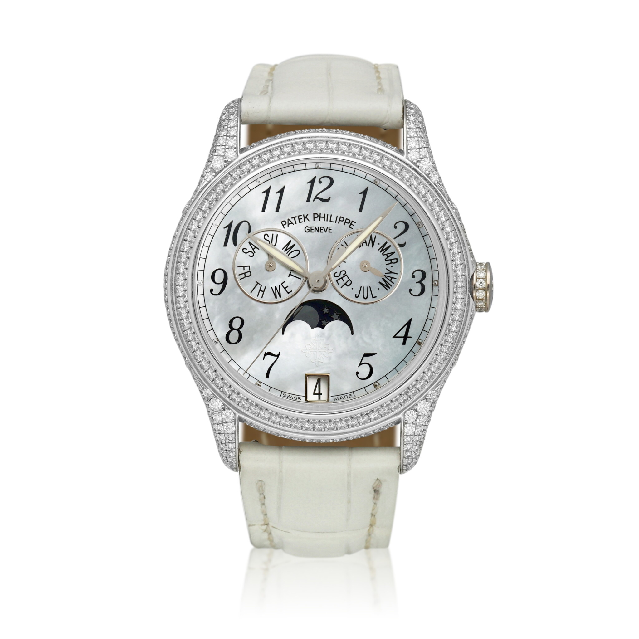 Complications (Reference 4937). A 37mm white gold diamond-set automatic wristwatch with date, day, month, moon phase. and annual calendar. 2007  — view 1