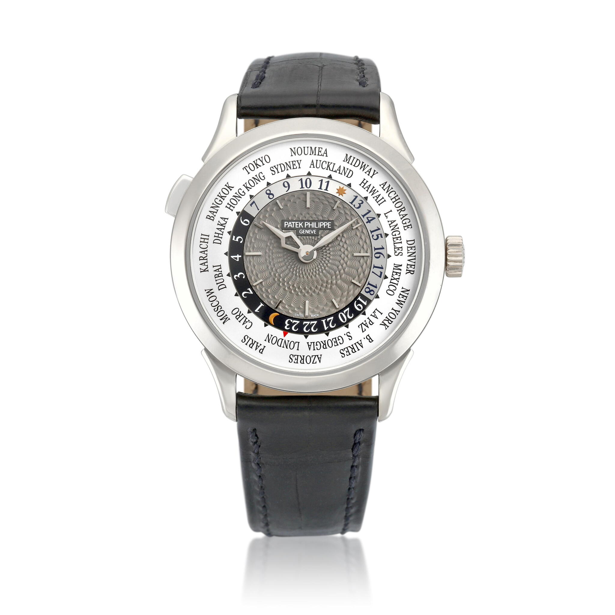 Complications (Reference 5230G-0001). A 39mm white gold automatic wristwatch with world time. 2016 — view 1