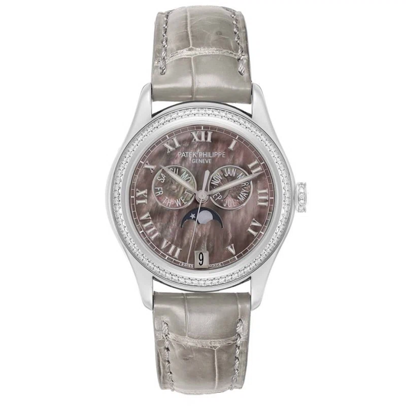 Complication (Reference 4936G). A 37mm white gold diamond set automatic wristwatch with date, day, month, moon phase, and annual calendar.