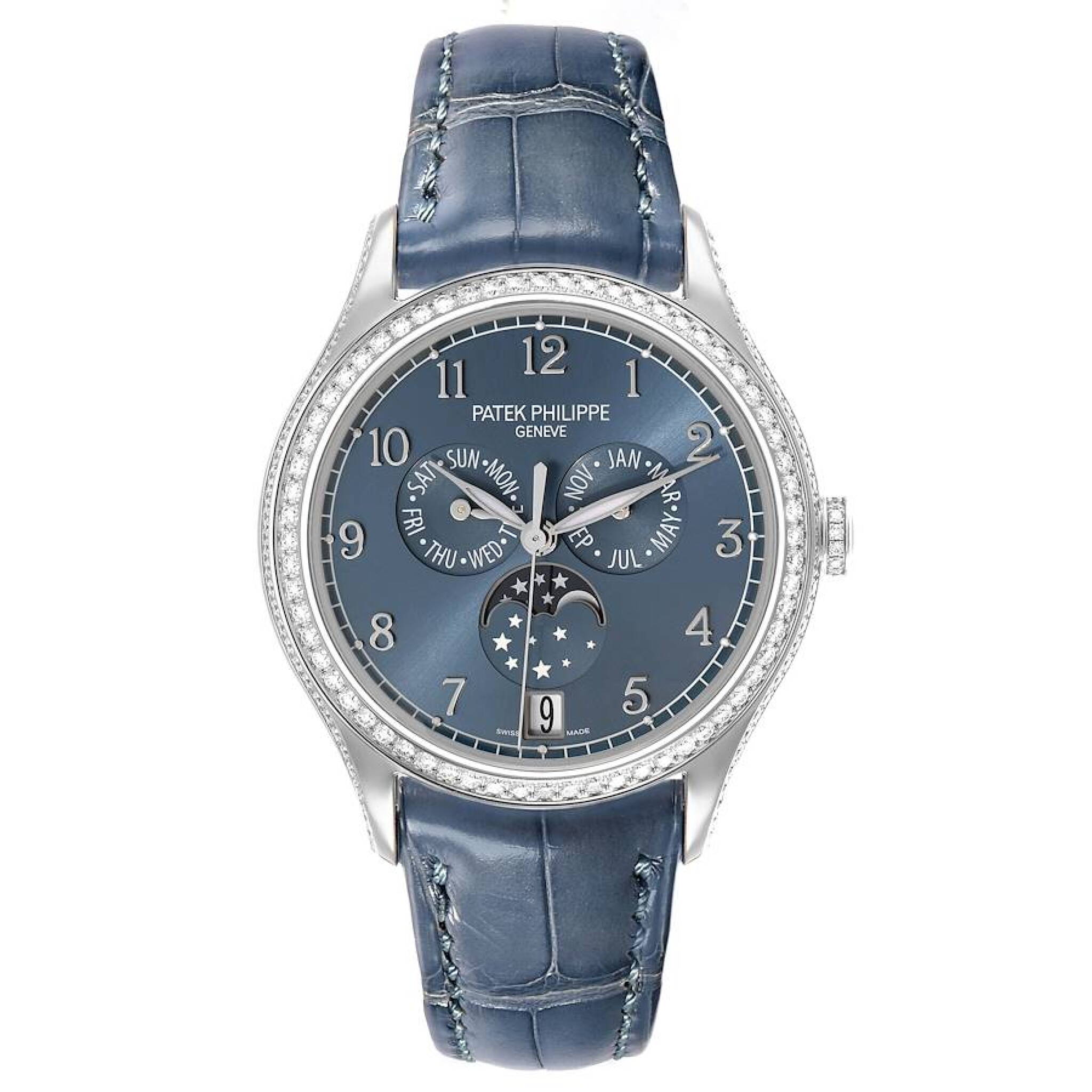 Complications (Reference 4947G-001). A 38mm white gold diamond-set automatic wristwatch with date, day, month, moon phase, and annual calendar. 2019 — view 1