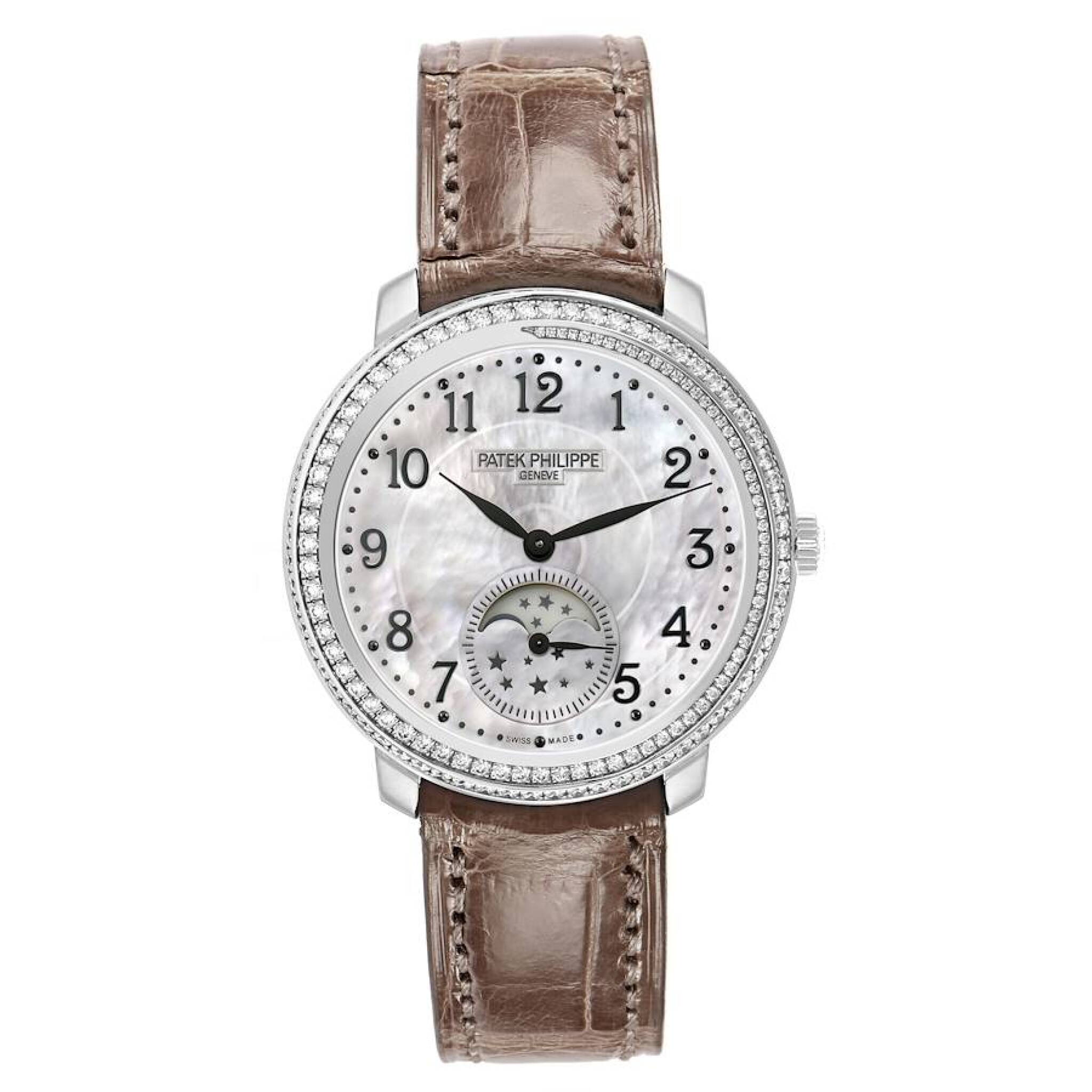 Complications (Reference 4968G-010). A 33mm white gold diamond-set manual wind wristwatch with moon phase. 2015 — view 1