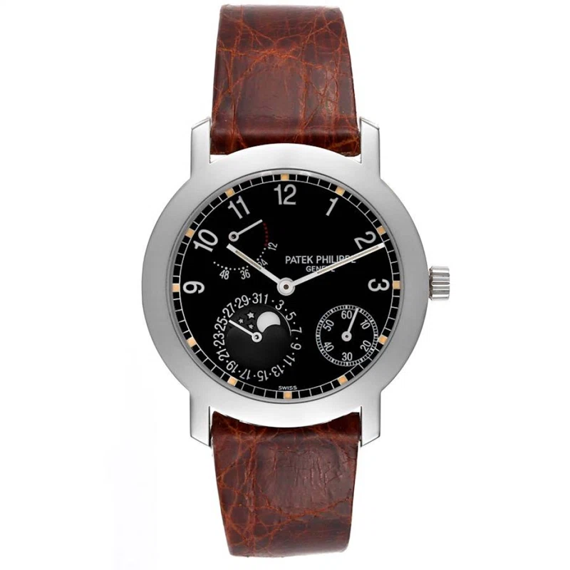 Complications (Reference 5055G-001). A 36mm white gold automatic wristwatch with date, moon phase, and power reserve. 2010
