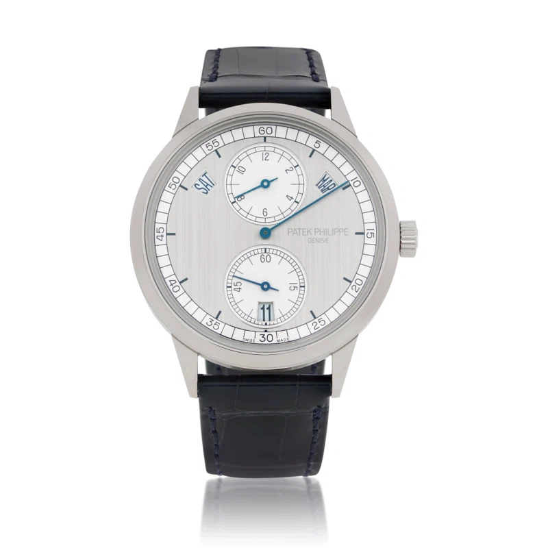 Complications (Reference 5235G-001). A 40mm unworn white gold automatic wristwatch with day, date, month, dual time, and annual calendar. 2021
