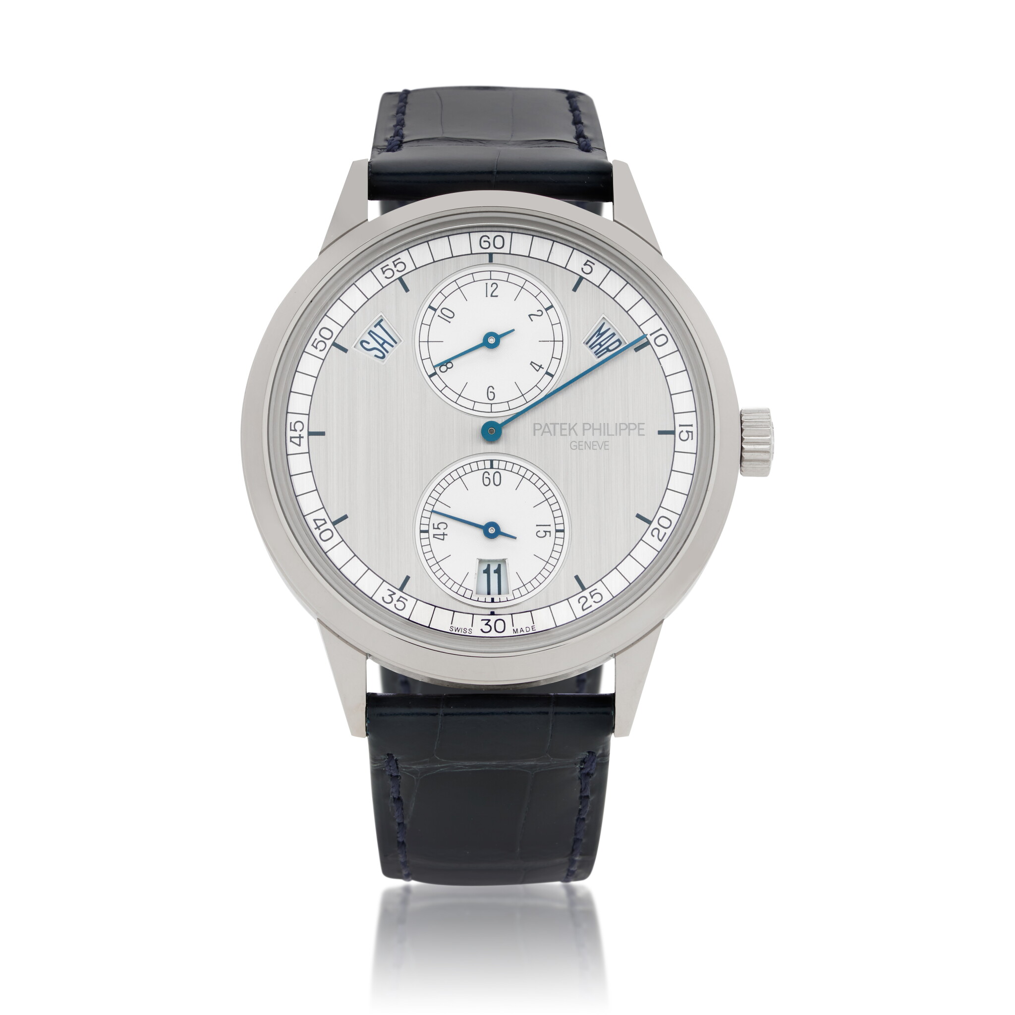 Complications (Reference 5235G-001). A 40mm unworn white gold automatic wristwatch with day, date, month, dual time, and annual calendar. 2021 — view 1