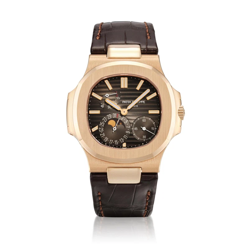 Nautilus (Reference 5712R). A 40mm rose gold automatic wristwatch with date, moon phases and power reserve indication. 2021