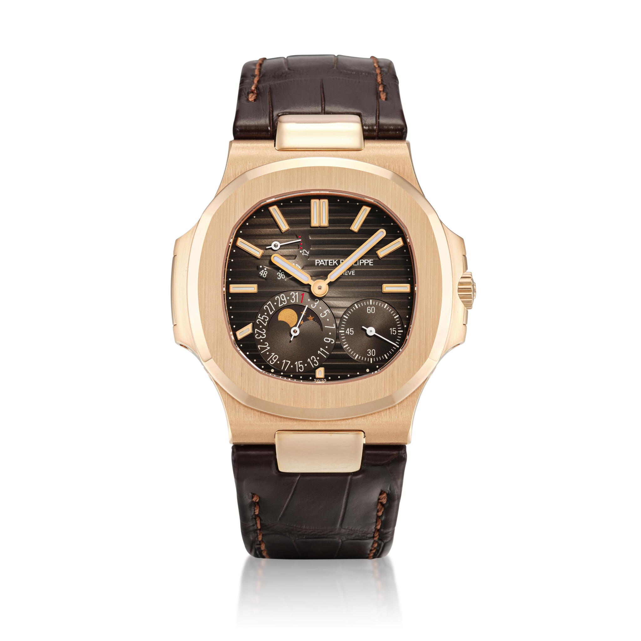 Nautilus (Reference 5712R). A 40mm rose gold automatic wristwatch with date, moon phases and power reserve indication. 2021 — view 1