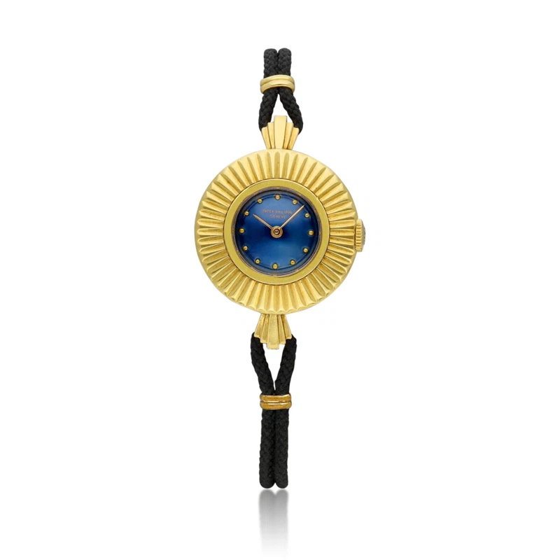 Patek Philippe. A 24mm gold manual wind wristwatch. 1970