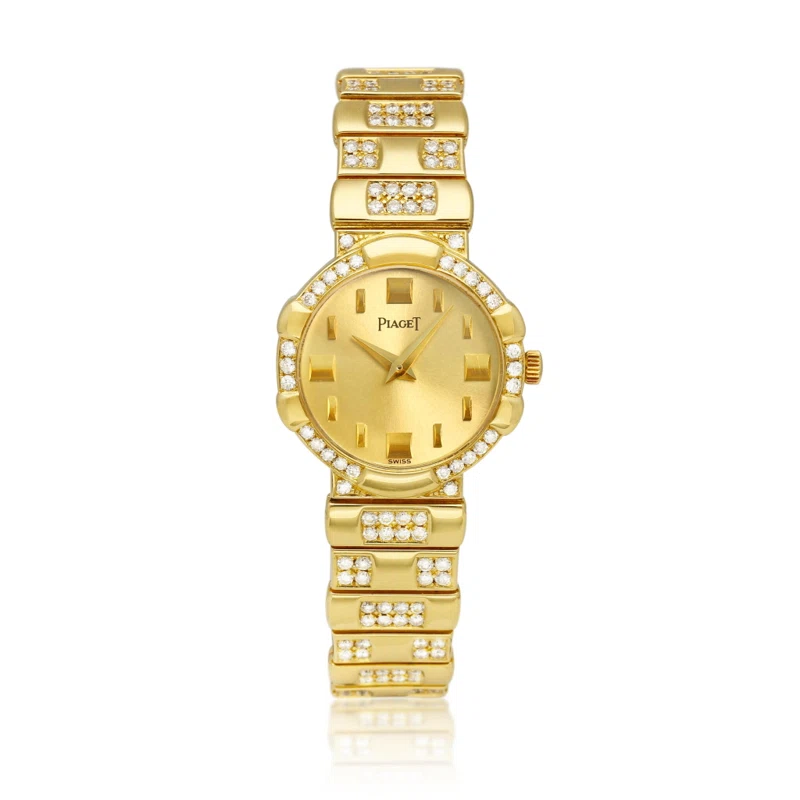 (Reference 8601). A yellow gold and diamond-set quartz bracelet watch. Circa 1980