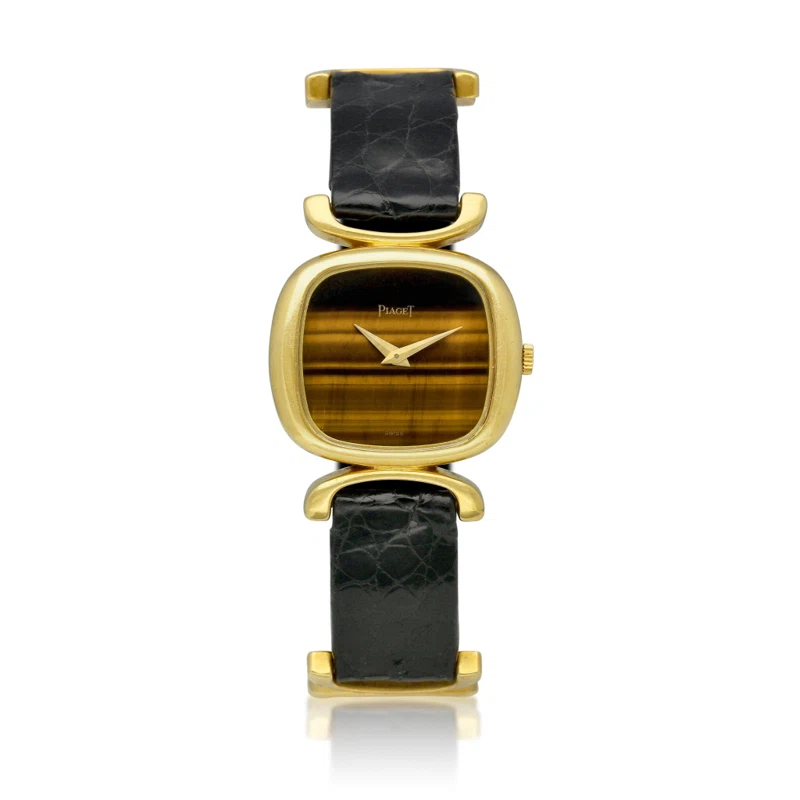 Piaget (Reference 9451D). A yellow gold mechanical wristwatch with Tiger's Eye dial. Circa 1980
