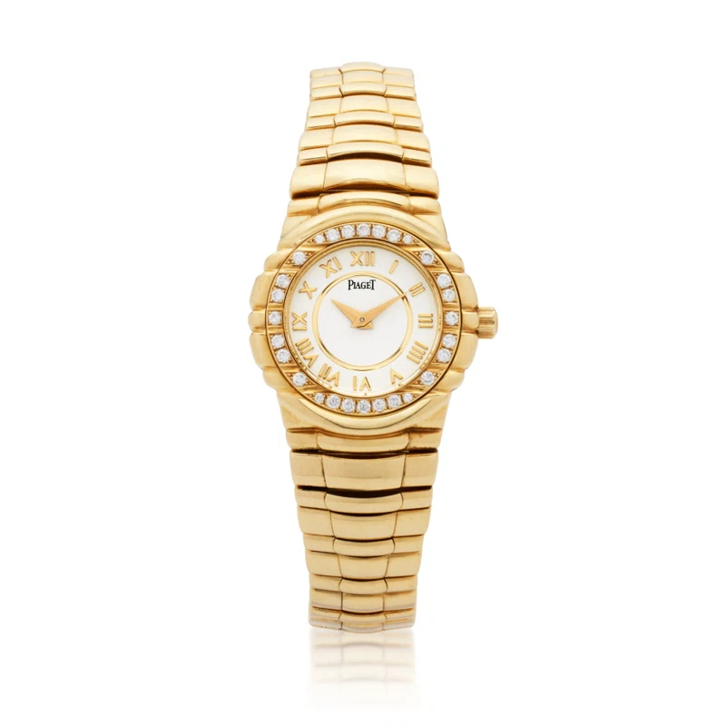 Piaget Tanagra (Reference 16033 M 401 D). A 25mm yellow gold diamond set quartz watch.