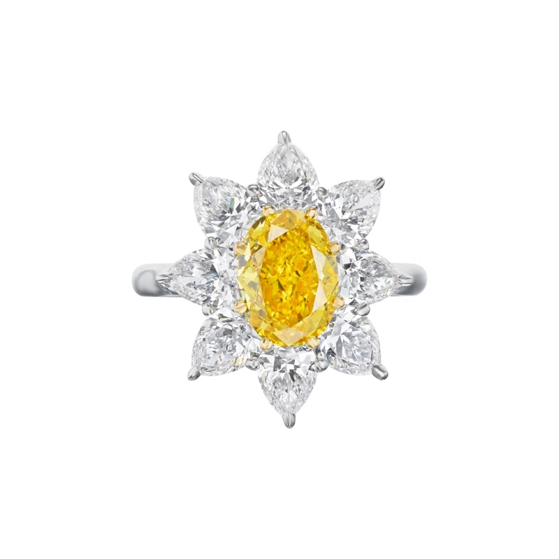 Platinum, Gold, 2.01ct Oval Cut Fancy Vivid Orangey Yellow Diamond and Diamond Ring