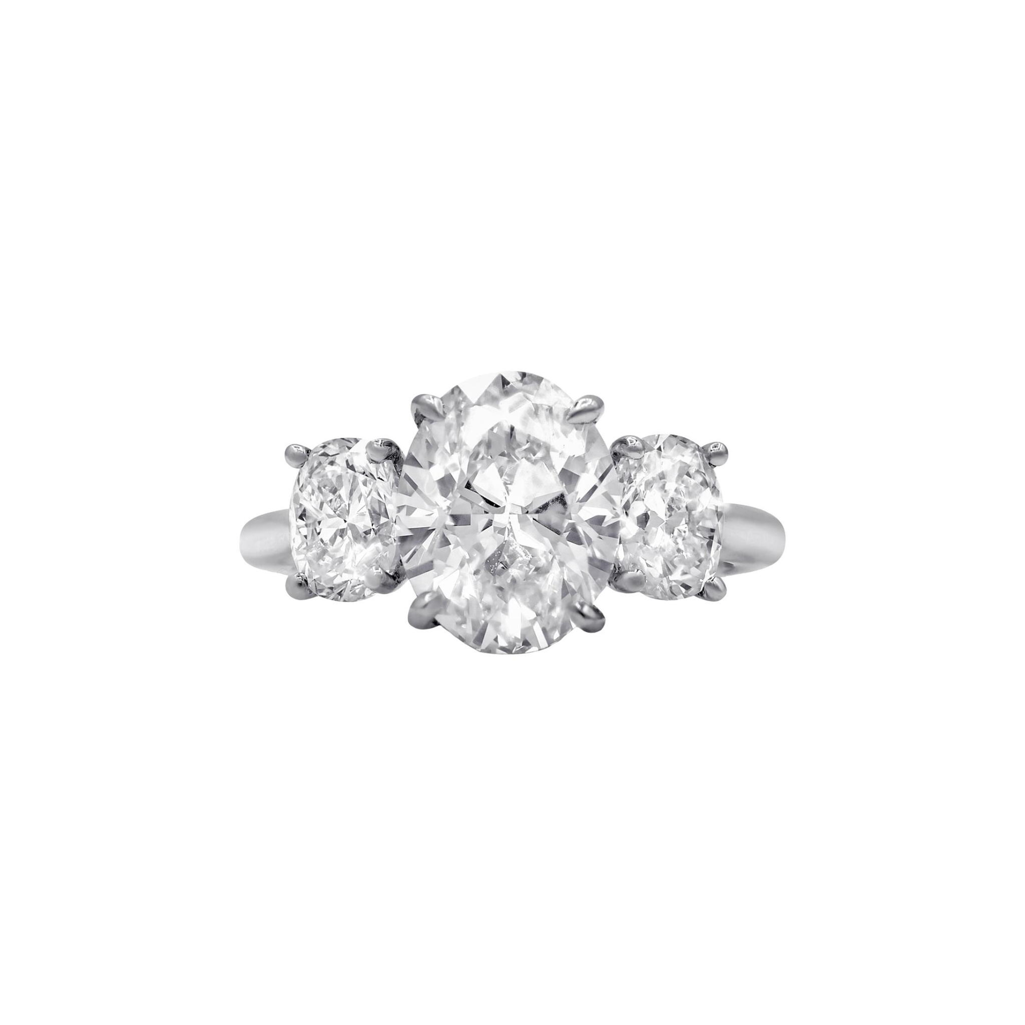 Platinum, 3.26ct Oval Cut Diamond and Diamond Three Stone Engagement Ring — view 1