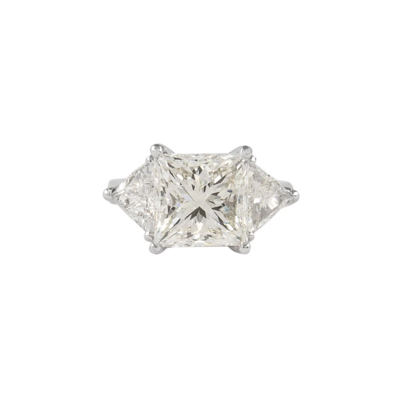 Platinum, 6.05ct Princess Cut Diamond and Diamond Three Stone Ring