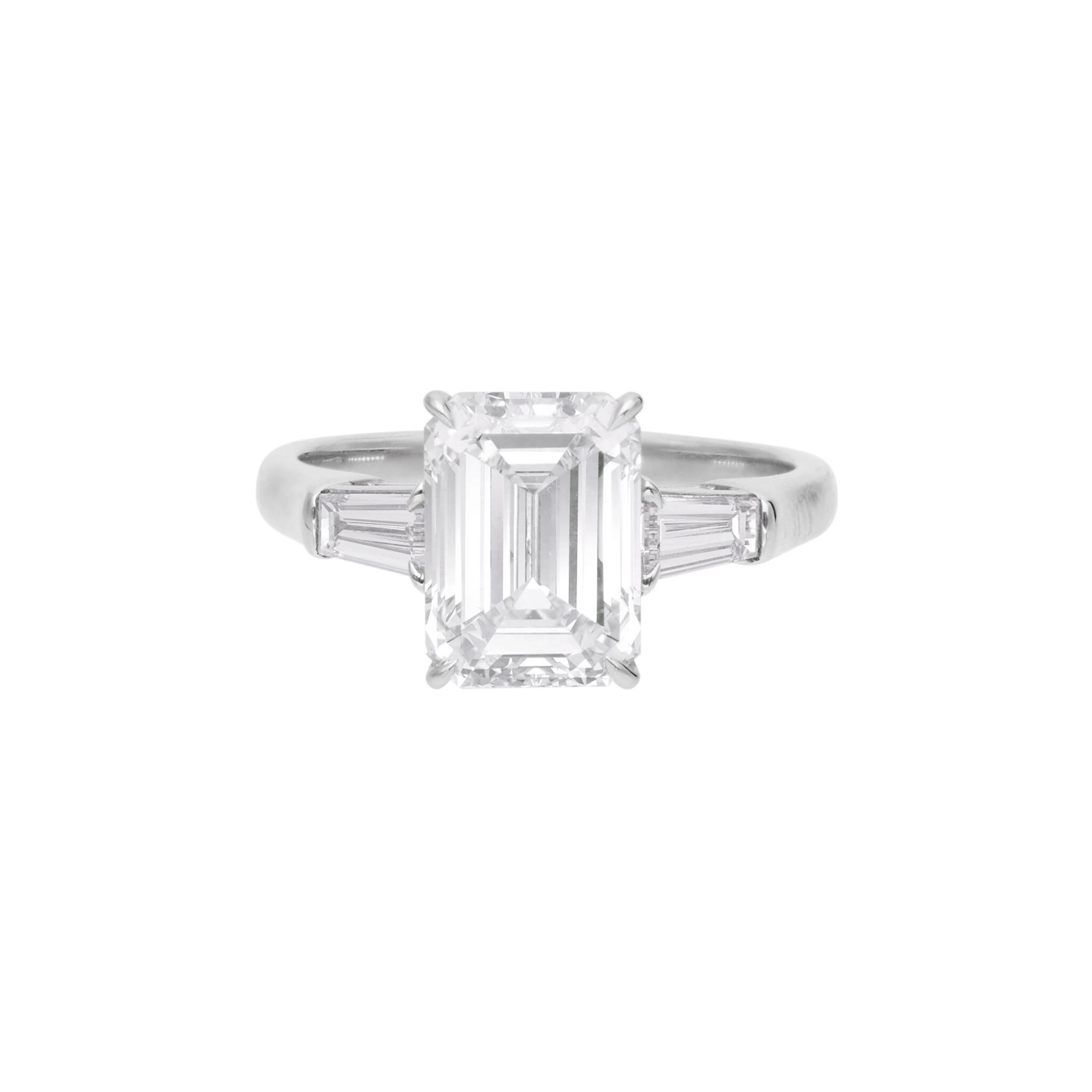 Platinum and 3.01ct Emerald Cut Diamond Three Stone Engagement Ring — view 1
