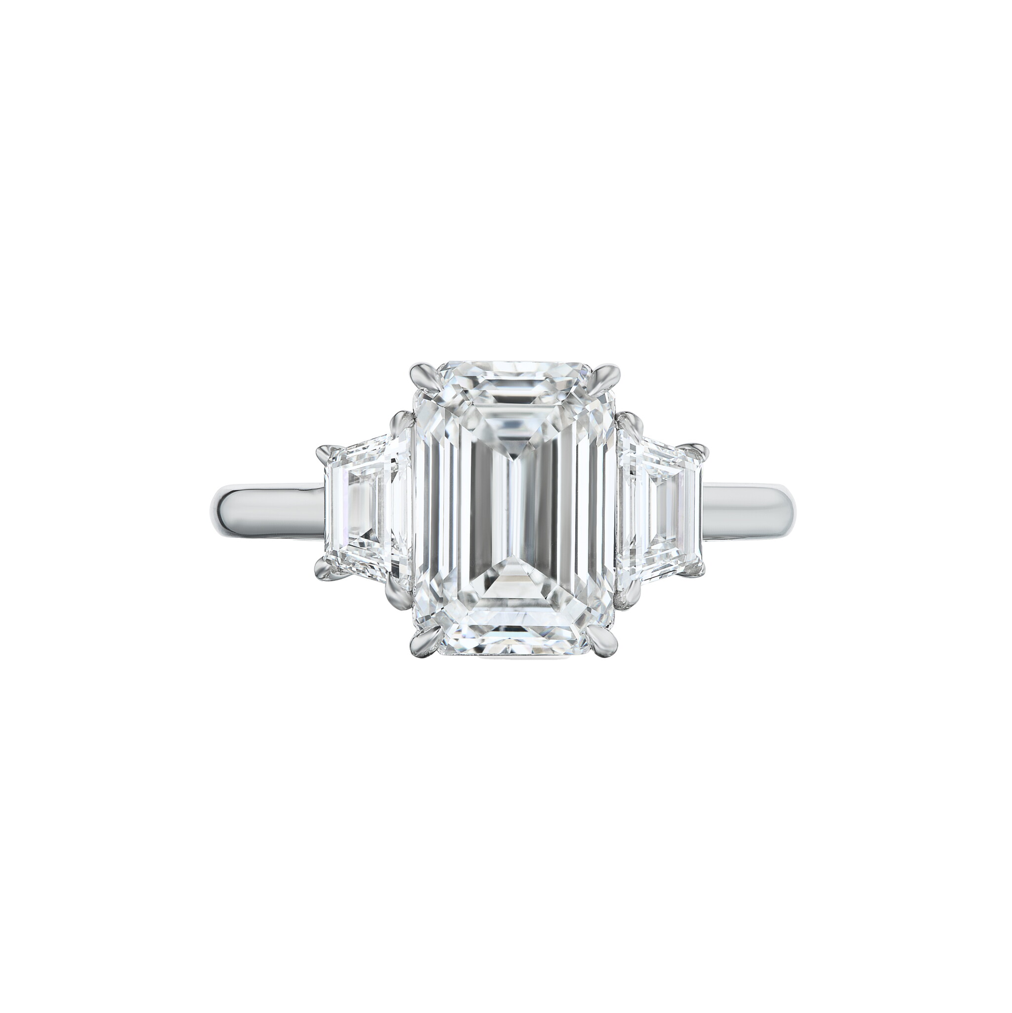 Platinum and 4.02ct Emerald Cut Diamond and Diamond Three Stone Engagement Ring — view 1