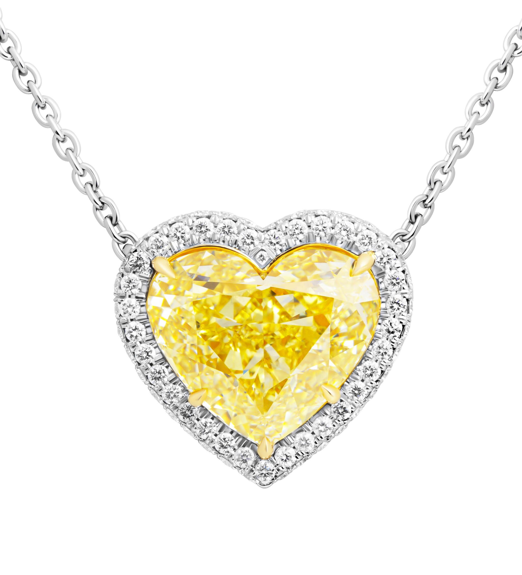 Platinum, Gold, 10.14ct Heart Cut Fancy Yellow Diamond and Diamond Pendant Necklace — view 1