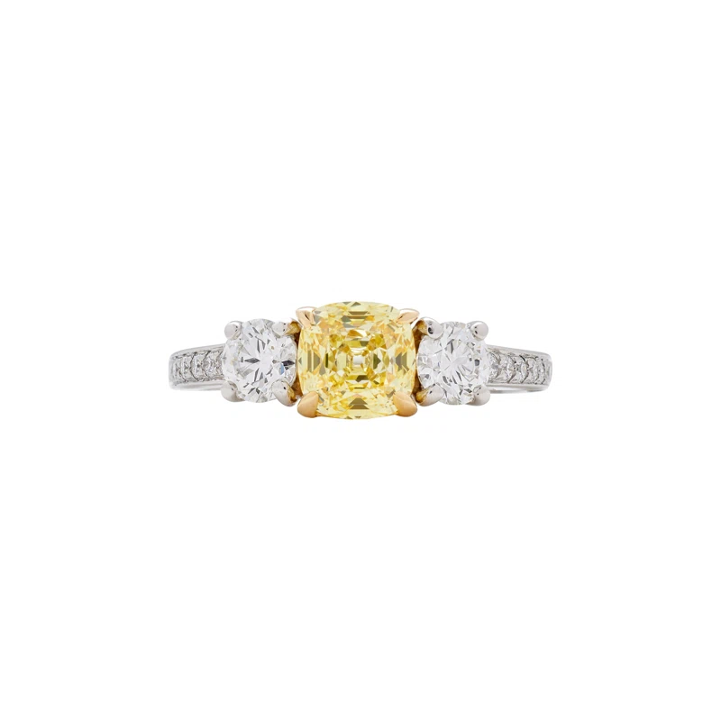Platinum, Gold, 1.02ct Fancy Yellow Diamond and Diamond Threestone Ring