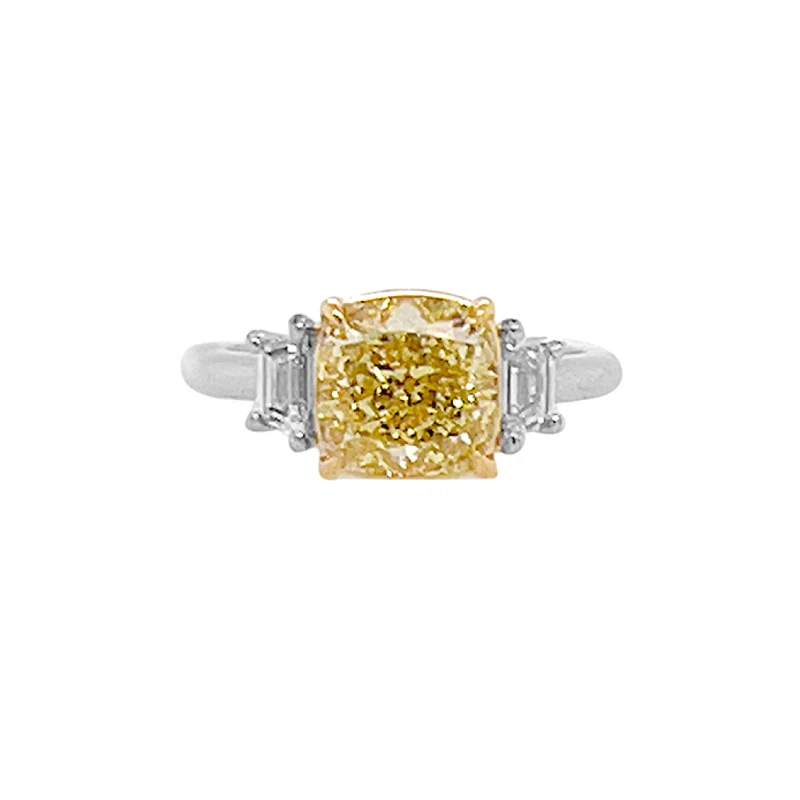 Platinum, Gold, 3.12ct Cushion Cut Fancy Yellow Diamond and Diamond Engagement Three Stone Ring