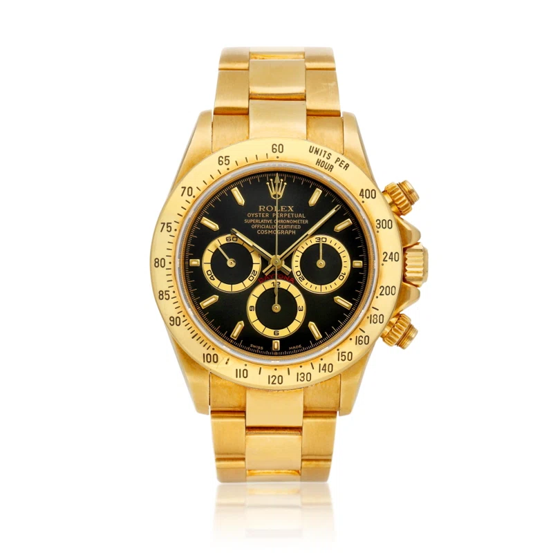 Cosmograph Daytona (Reference 16528). A 40mm yellow gold automatic wristwatch with chronograph. 1999