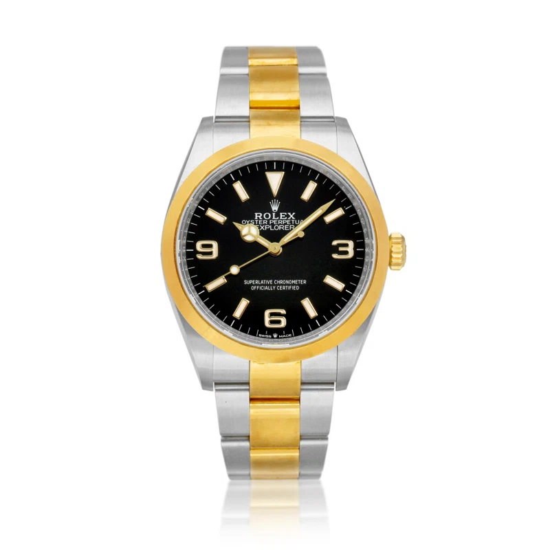 Explorer I (Reference 124273). A 36mm stainless steel yellow gold automatic wristwatch. 2022