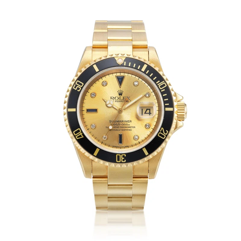 Submariner (Reference 16618). A yellow gold, diamond and sapphire-set automatic wristwatch with date and bracelet. Circa 1991