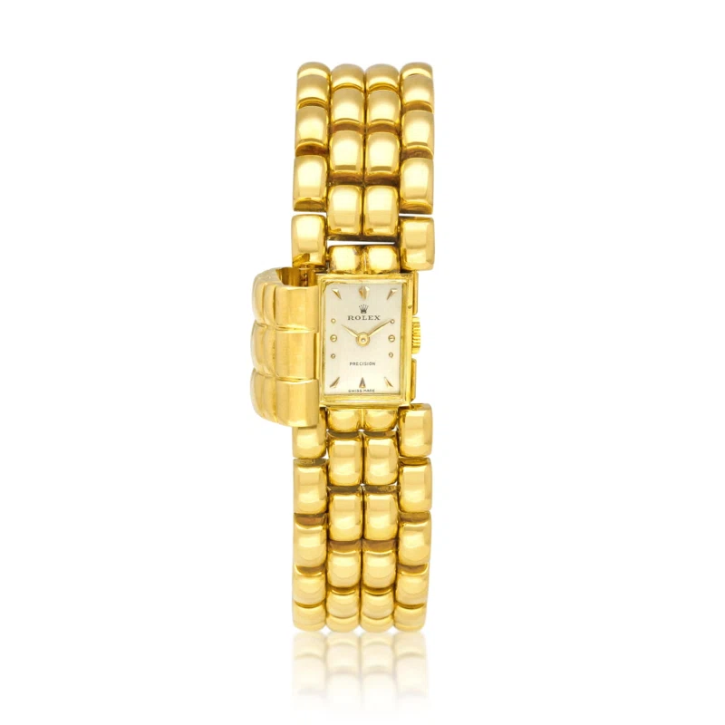 Rolex. A yellow gold manual wind bracelet watch with concealed dial. Circa 1948