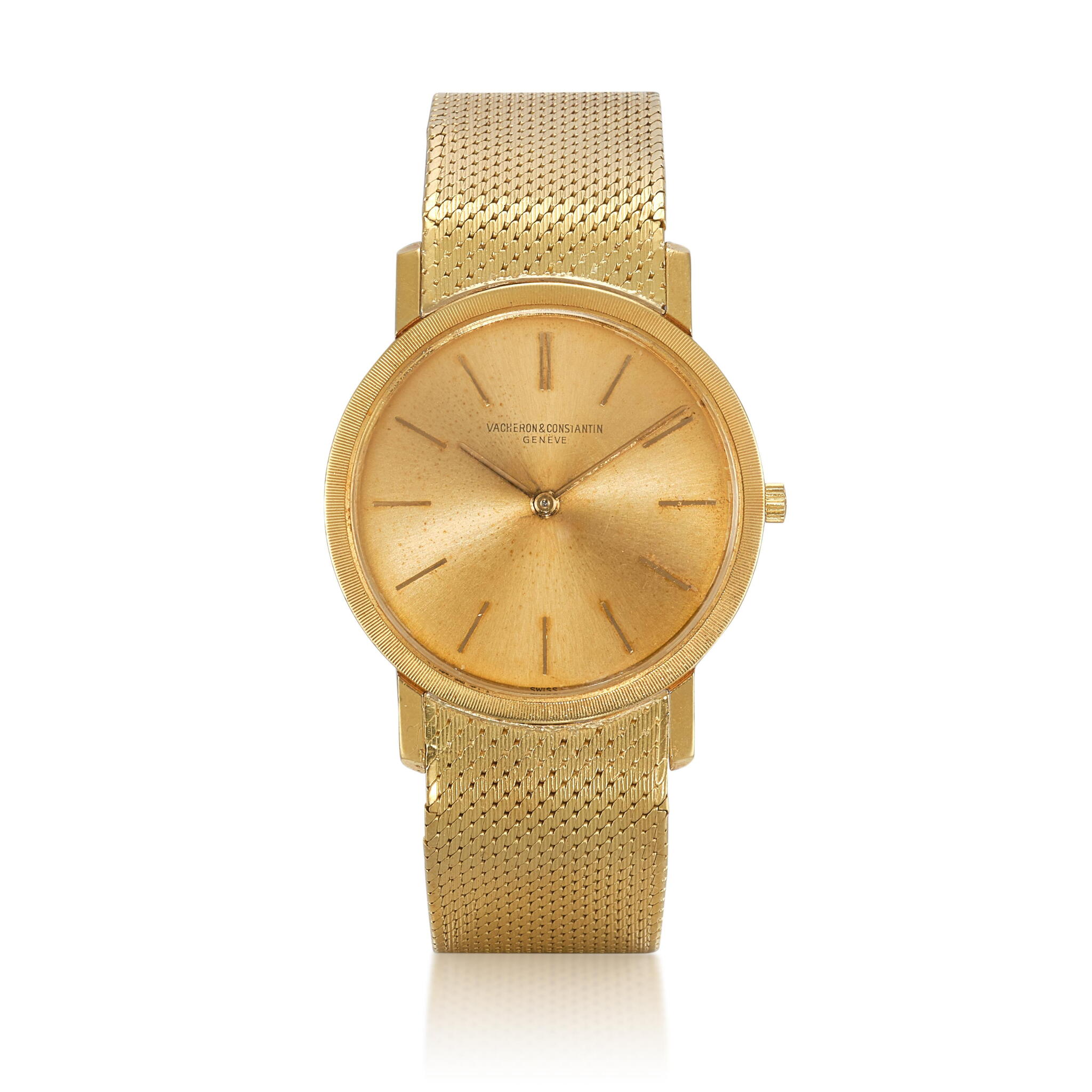 Patrimony (Reference 6351). A yellow gold manual winding wristwatch with bracelet. Circa 1970 — view 1