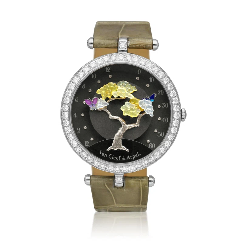 Lady Arpels Butterfly Symphony (Reference VCARO44100). A white gold and diamond-set mechanical wristwatch with retrograde hours, minutes display and onyx dial. Circa 2010