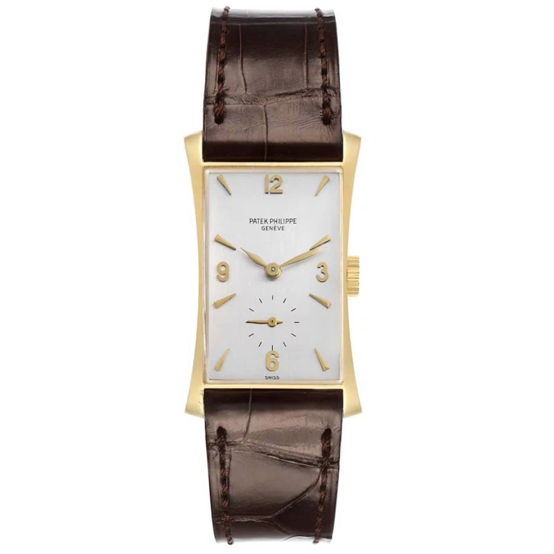 Vintage Patek Philippe Hour Glass (Reference 1593). A 39mm yellow gold manual wind wristwatch.